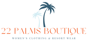 Logo for "22 Palms Boutique" featuring two palm trees, one light blue and one dark blue, above orange text. Below the text is smaller blue text: "Women's clothing & resort wear".