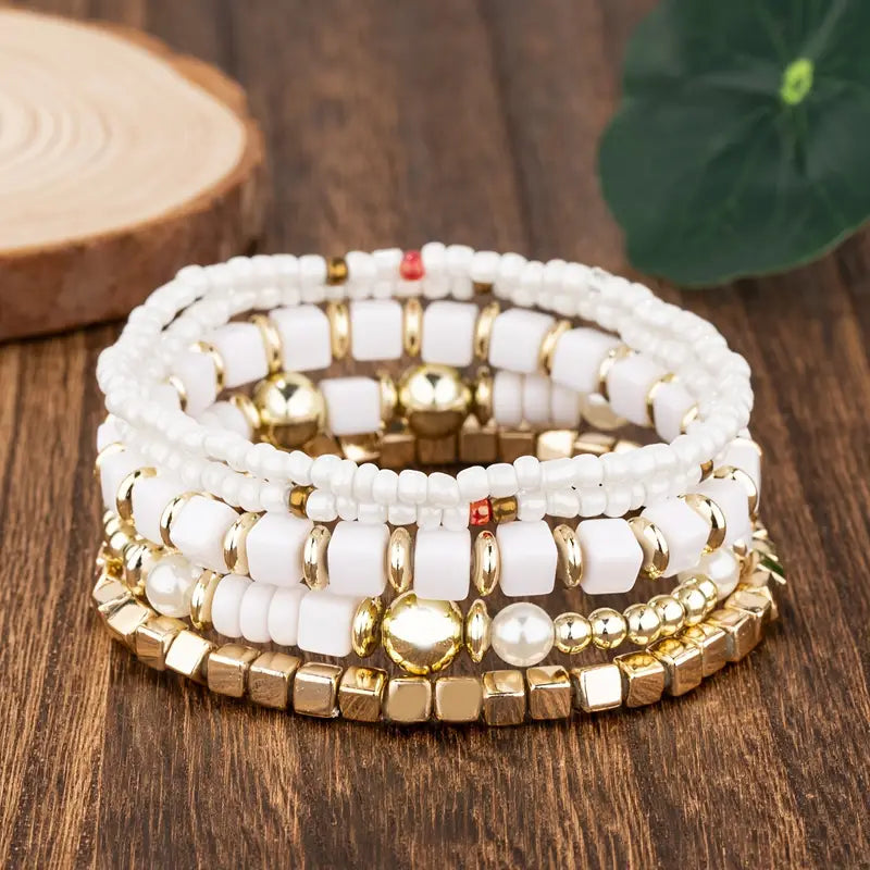 Multi beaded bracelet stack set in white